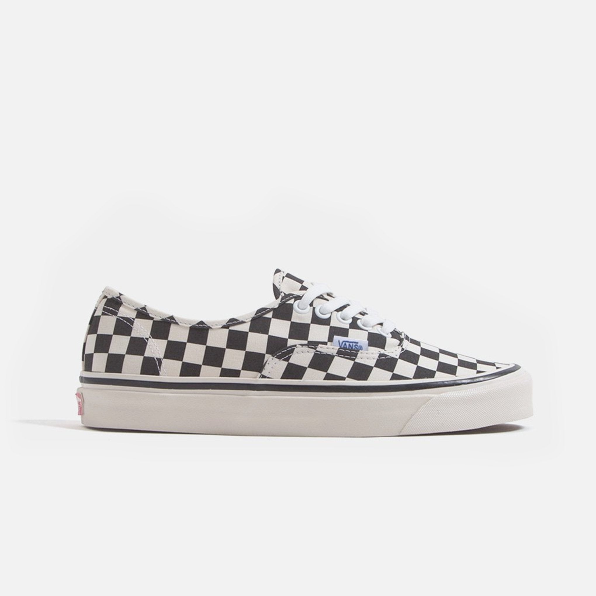 Checked black and white vans hotsell