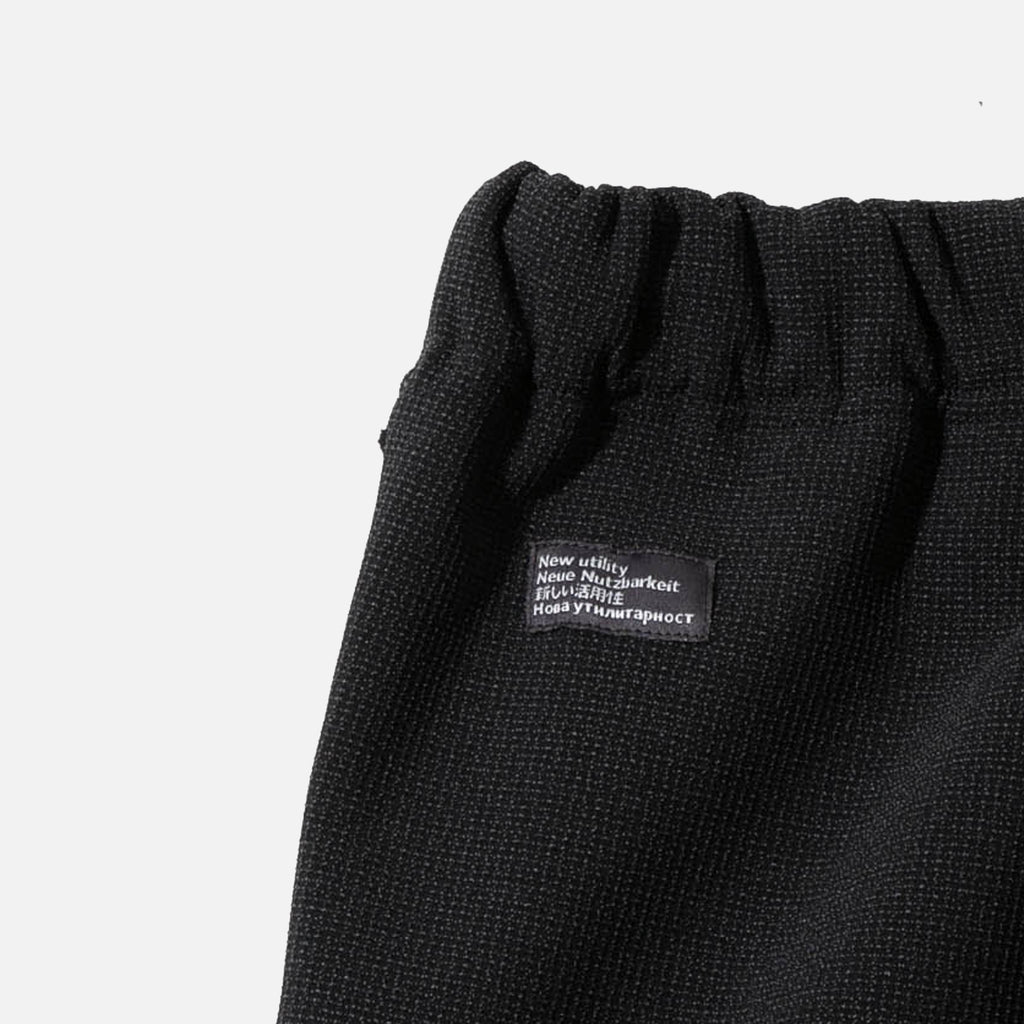 Transit pant in black grid from AFFXWRKS blues store www.bluesstore.co