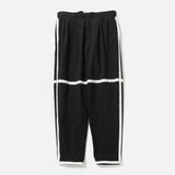 Taped TN Two Tuck Pants in Black from the Cav Empt blues store www.bluesstore.co