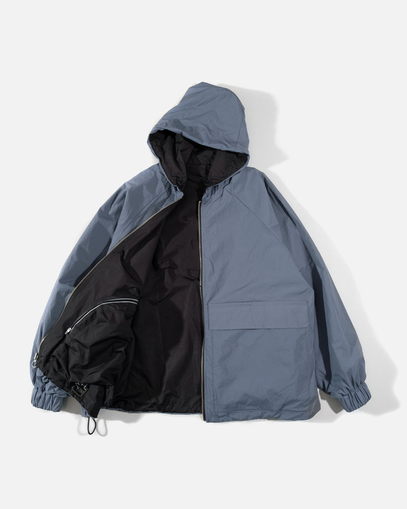Switch Parka in Blue and Black from the Noroll Spring / Summer 2023 collection blues store www.bluesstore.co